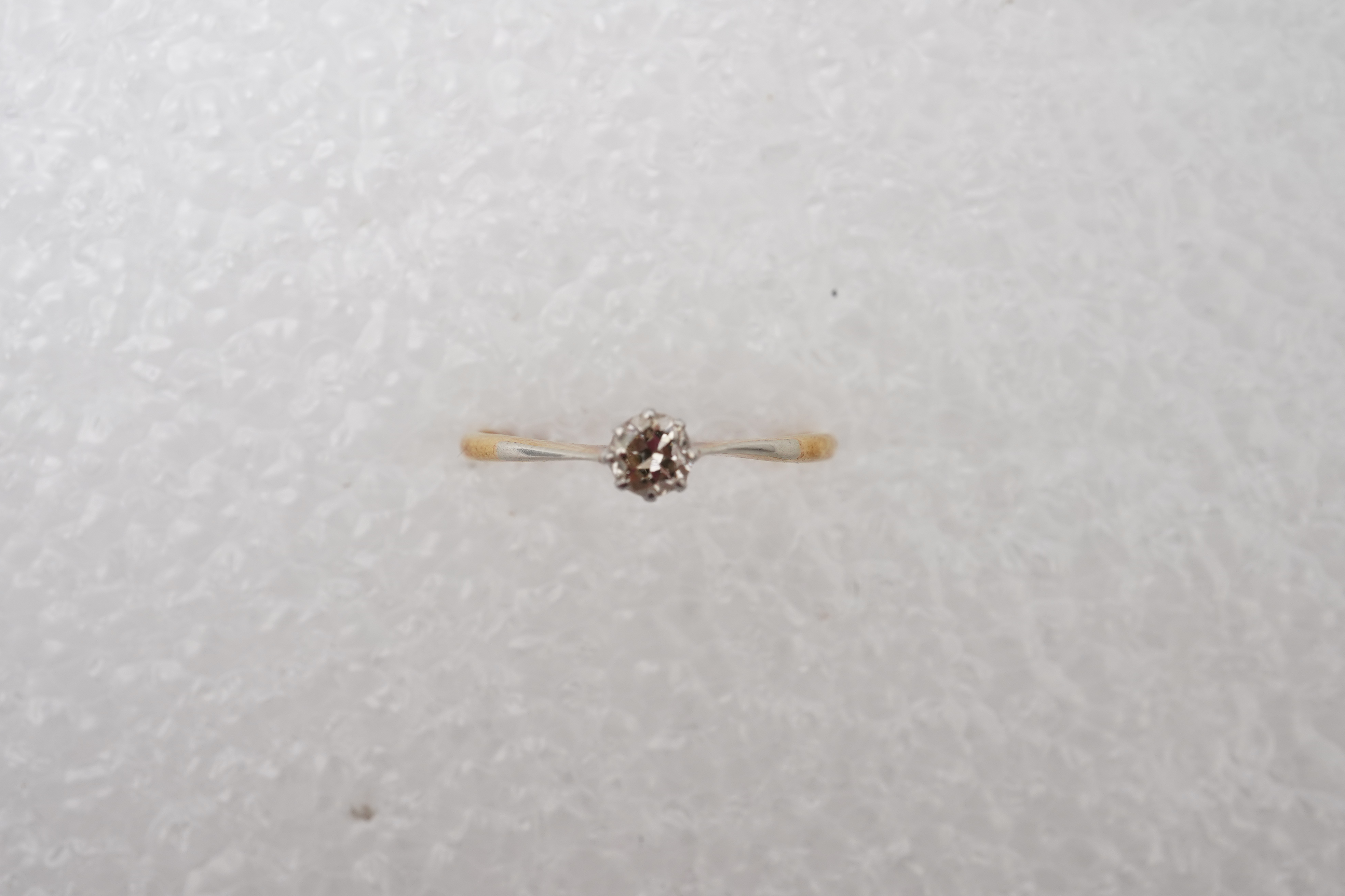 A small solitaire diamond ring, early 20th century